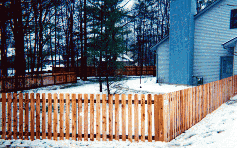 Dog ear space picket fence