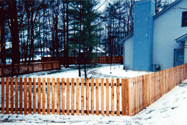 Dog ear space picket fence