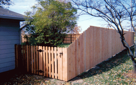 Dog ear privacy fence tapered to dog ear space picket fence