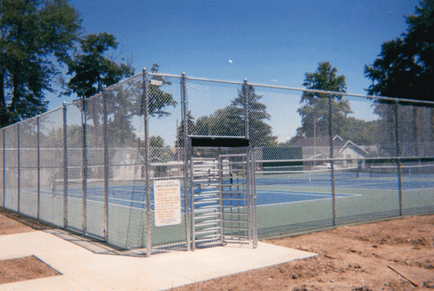 Chainlink tennis court fence with turnstile gate
